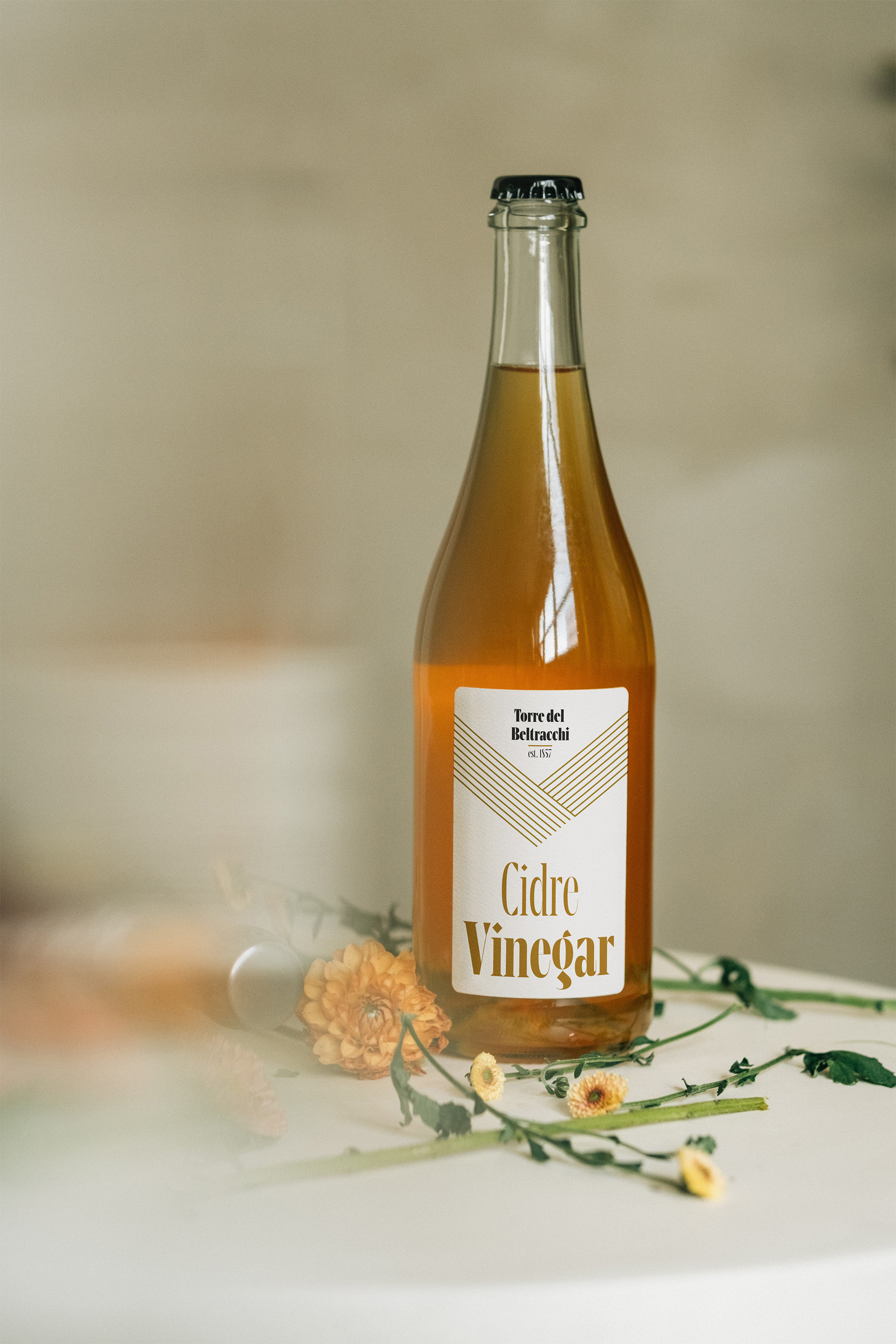 Maurizio_InUse_1_Glass Bottle Mockup_WEB